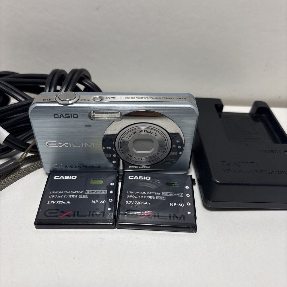 Casio Exilim EX-Z80A 8.1MP Digital Camera Silver 2 Batteries 1 Charger No Card